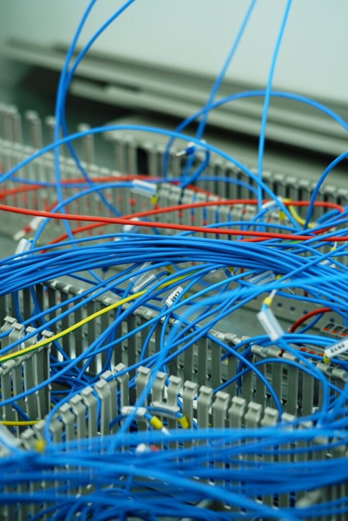 The Art of Drawing Readers In: Your attractive post title goes here Detailed shot of tangled electrical cables in server room, showcasing technology complexity.